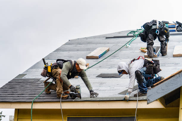 Professional Gutter Installation technician working in Hope, RI